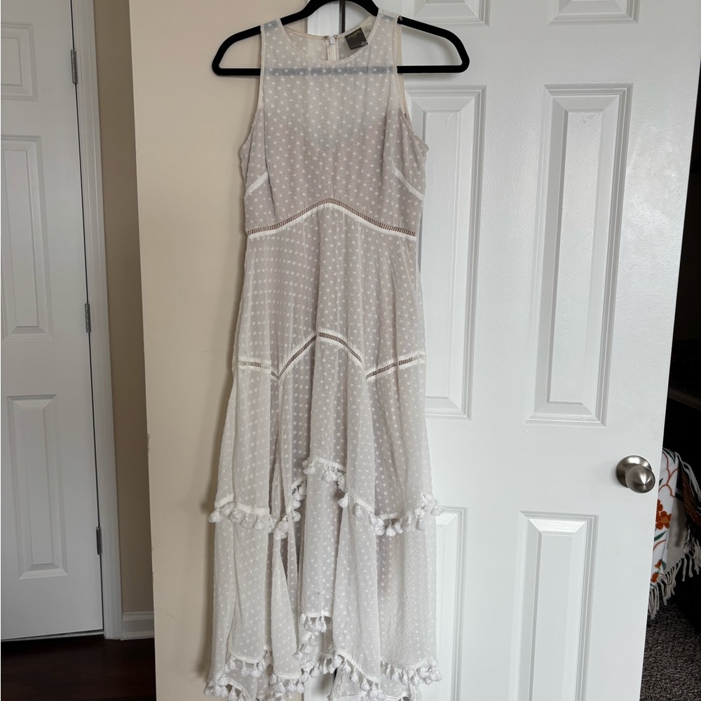 Sheer White Sleeveless Dress with Ruffle Hem